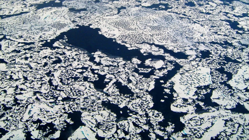 Methane leaking through cracks in the Arctic tundra. Photo by NASA's Earth Observatory; used under Creative Commons.